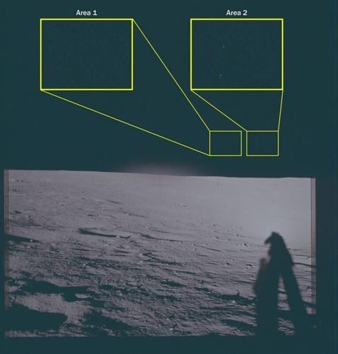 This archival photograph depicts the lunar surface as viewed from the landing site of Apollo 12. This image features two highlighted areas of interest, labeled “Area 1” and “Area 2,” slightly to the right of the vertical axis of the frame, above the hor...