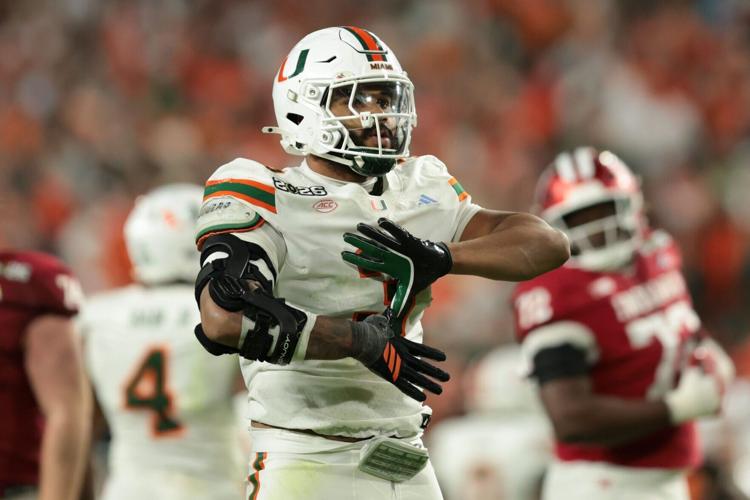 Jan 19, 2026; Miami Gardens, FL, USA; Miami Hurricanes defensive lineman Akheem Mesidor (3) celebrates after a sack against the Indiana Hoosiers in the third quarter during the College Football Playoff National Championship game at Hard Rock Stadium.
