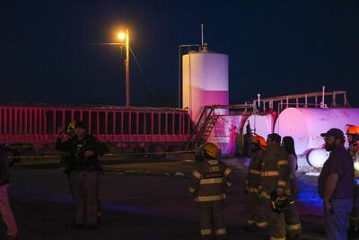 Semi rolls into fuel tank