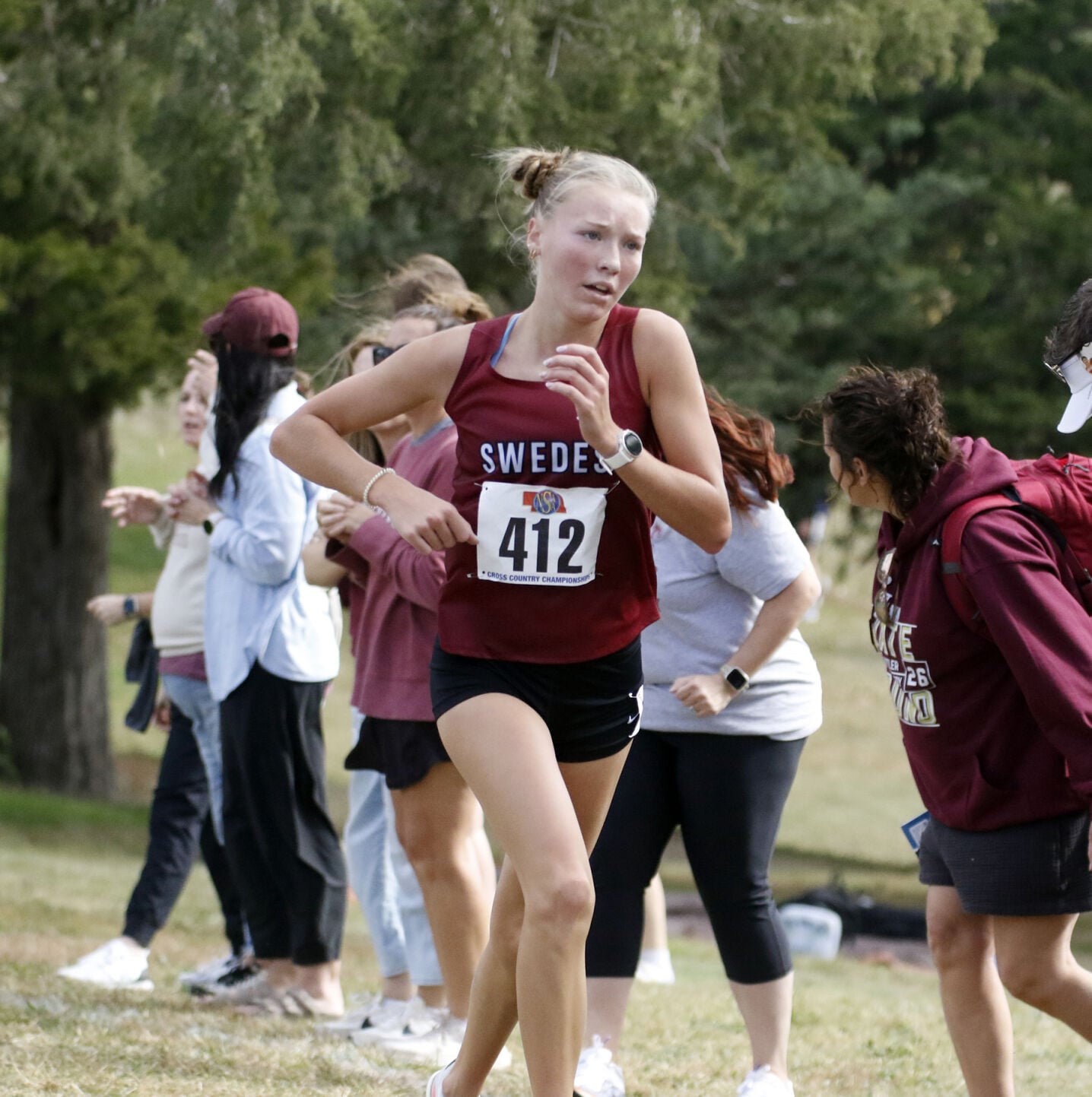 Scout Bell wins second state cross country title PAGE B1