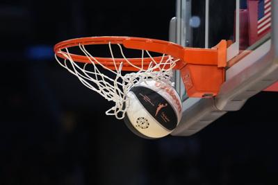 A Wilson official WNBA Evo NXT basketball with the 30th anniversary logo.