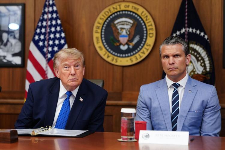 U.S. President Donald Trump and U.S. Secretary of Defense Pete Hegseth listen to questions from the press during a Cabinet meeting at Camp David in Maryland, on July 31, 2026.
