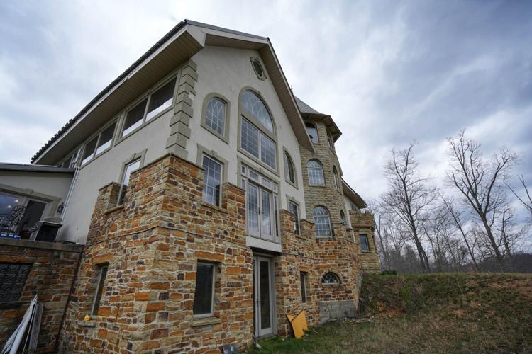 U.S. Rep. Thomas Massie has been building his timber and stone house for more than two decades. He gathered the materials from his 1,500 acre farm, cut the wood into lumber, and hand-chiseled the stones.