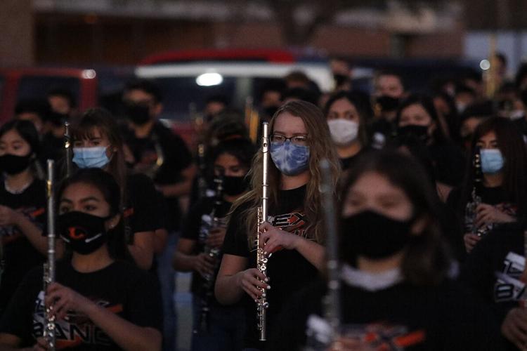 With no competitions to attend, Pride of the Minuteman Marching Band performs for the Lexington community