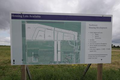 Dawson County commissioners deal with questions regarding taxation of land owned by political subdivisions, charitable foundations