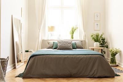 While boring interiors are certainly not in this year, Float Studio co-founder Brad Sherman said neutral tones will be a big bedroom design trend in 2023..