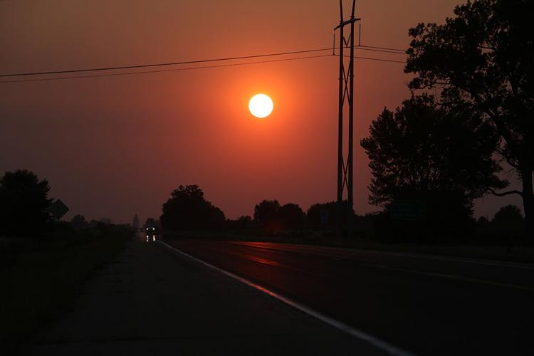 Haze from California wildfires causes air quality concerns, colors sunsets