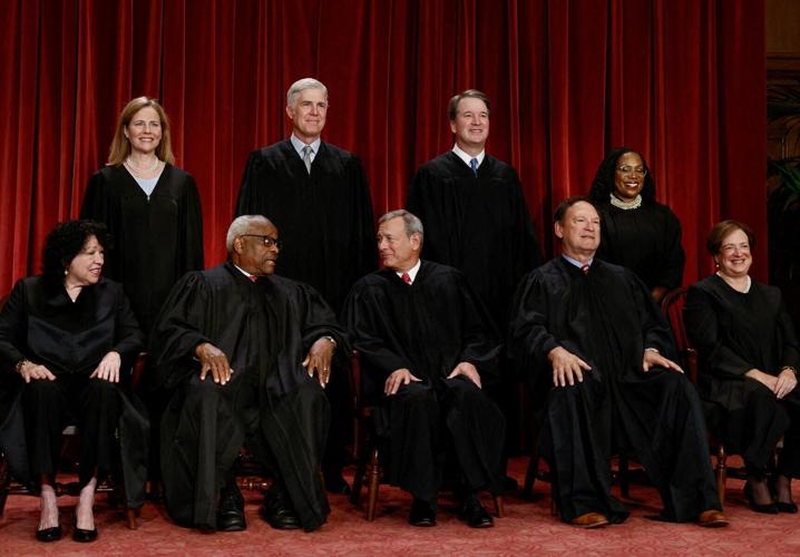 FILE PHOTO: U.S. Supreme Court justices pose for their group portrait at the Supreme Court in Washington