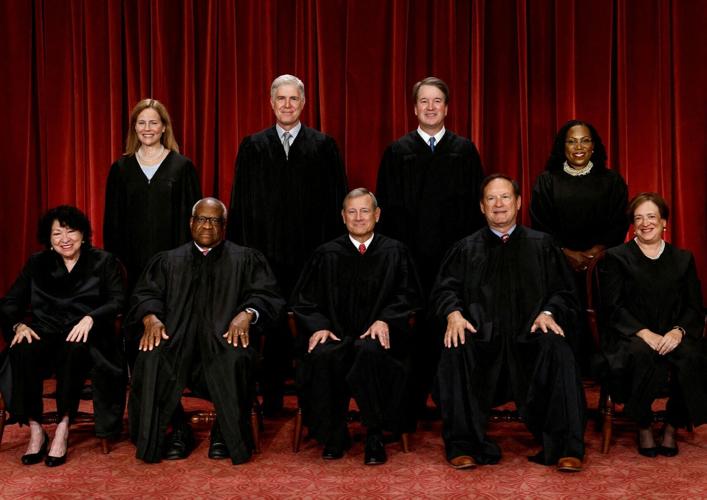 FILE PHOTO: U.S. Supreme Court justices pose for their group portrait at the Supreme Court in Washington