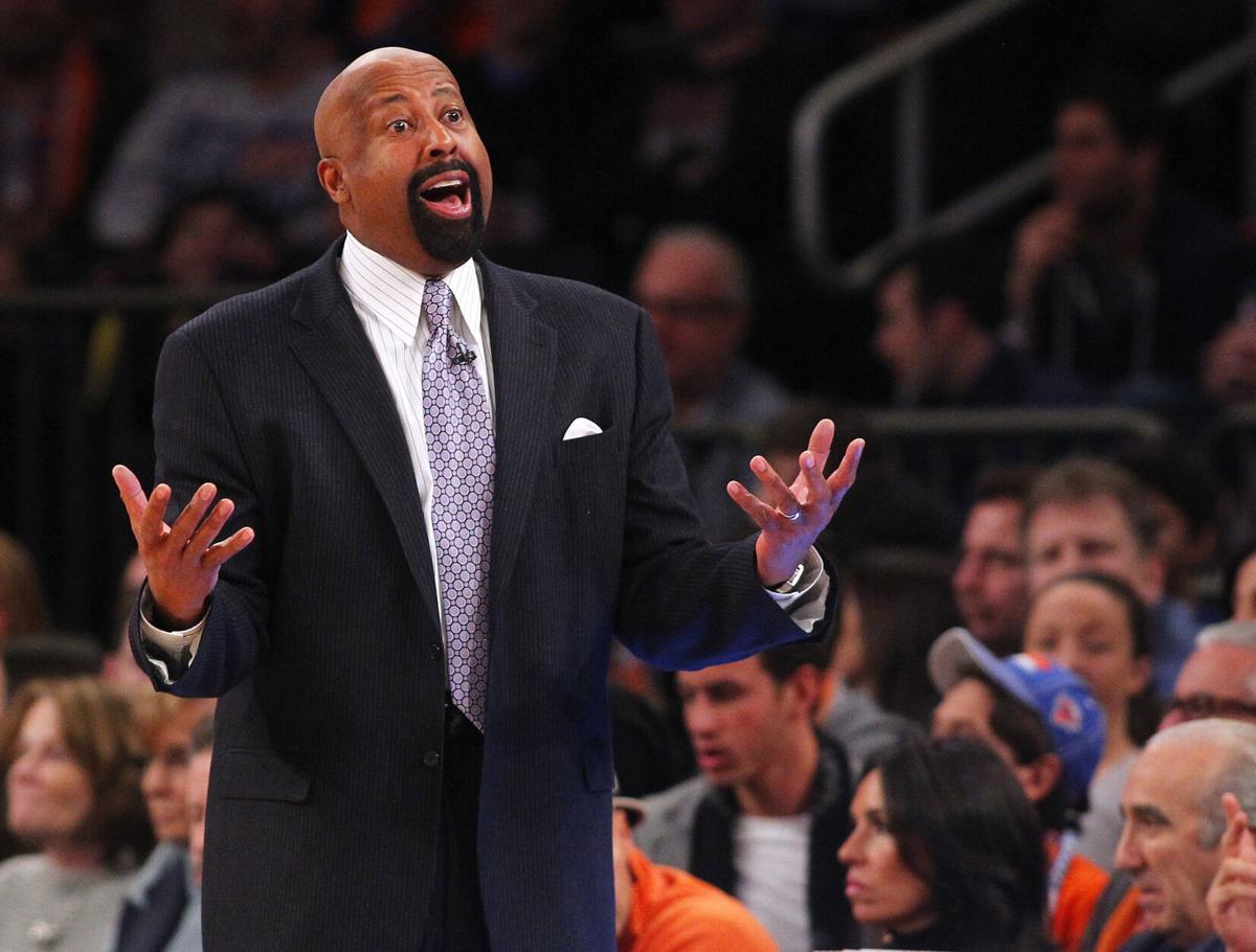 Head coach Mike Woodson of the New York Knicks yells to a ref during the second half of a game against the Miami Heat at Madison Square Garden on February. 1, 2014 in New York City.