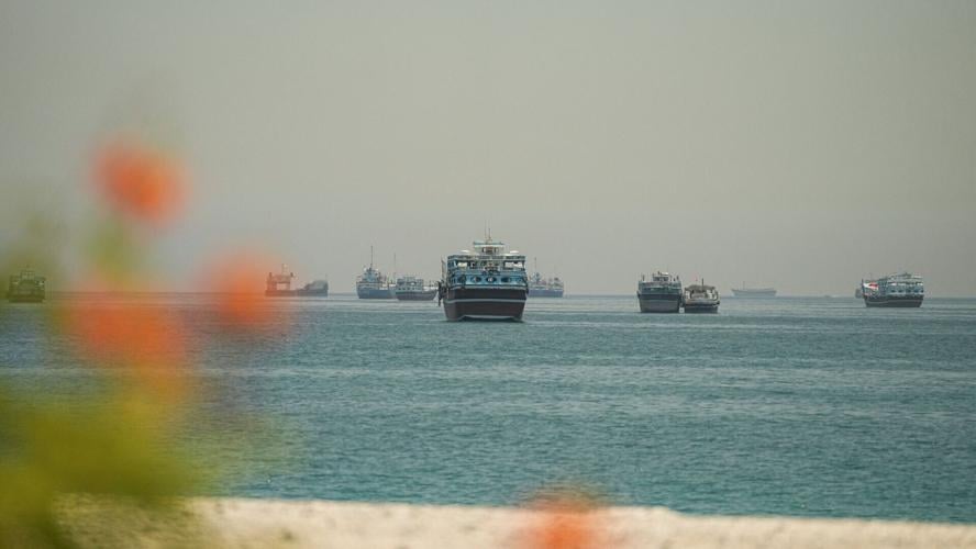 Vessels sail through the Strait of Hormuz