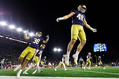Notre Dame linebacker Jerry Rullo (46) hypes up the crowd after a kickoff in the second half of a NCAA football game against Syracuse at Notre Dame Stadium on Saturday, Nov. 22, 2025, in South Bend.