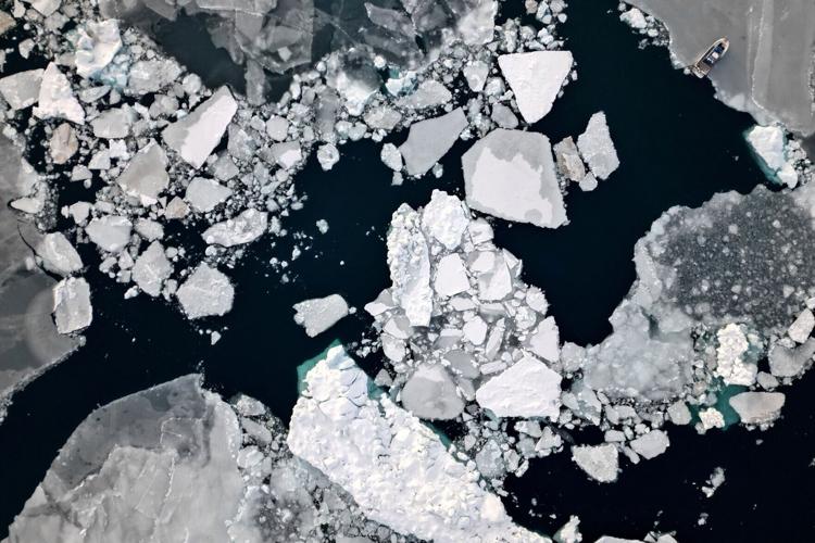 FILE PHOTO: Icebergs float near Nuuk