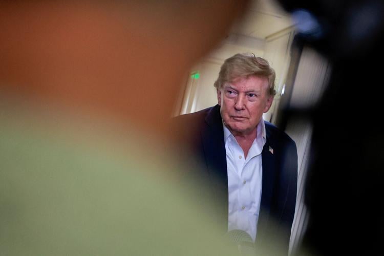 U.S. President Donald Trump speaks to members of the media after traveling to Ireland
