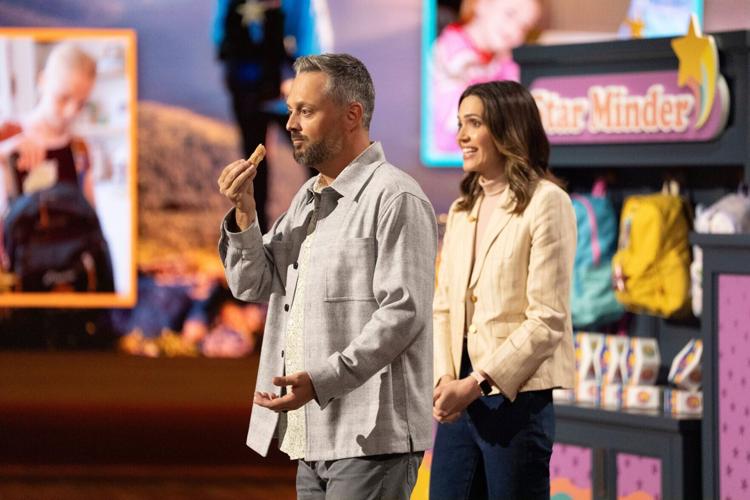 Nate (Nate Bargatze) tries to scarf down a doughnut while wife Katie (Mandy Moore) woos the "Shark Tank" crew in "The Breadwinner."
