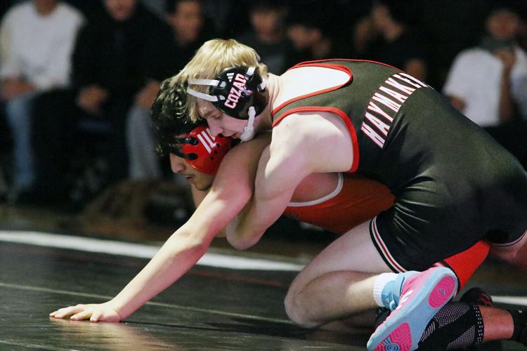 Lexington boys win dual over Cozad