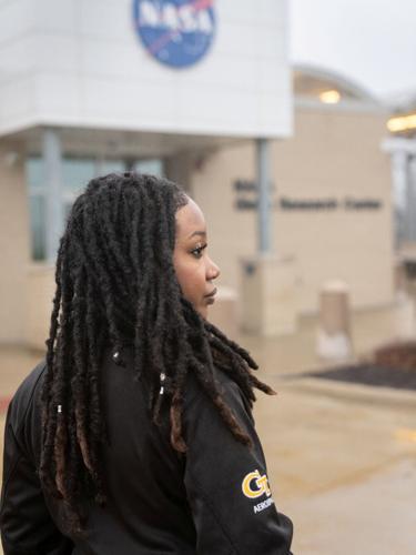 Circling the moon, a Black astronaut inspires millions