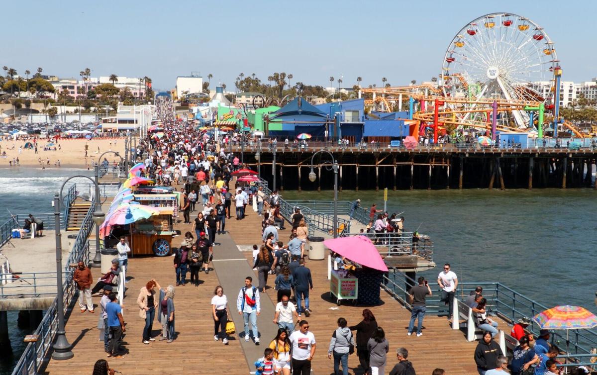 Tourists and Angelenos are swarming the Santa Monica Pier on Easter Sunday in Santa Monica, California, on April 21, 2019.