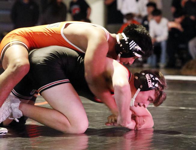 Lexington boys win dual over Cozad