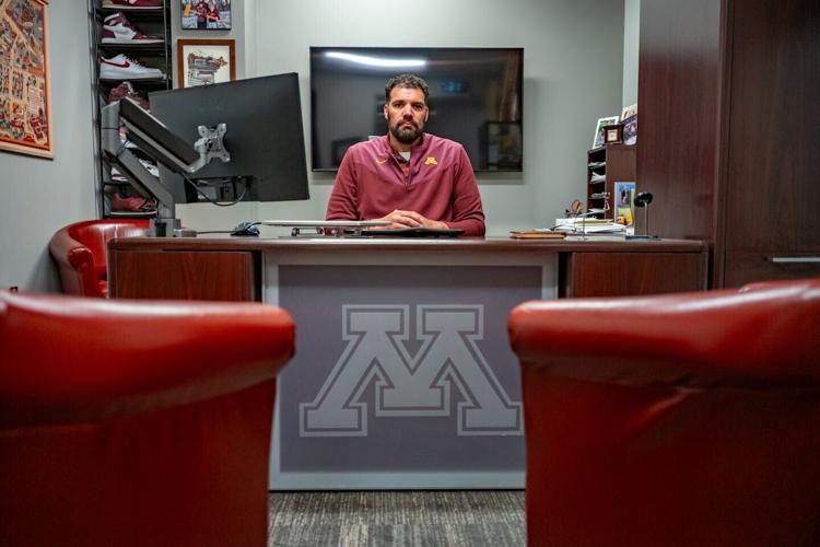 Jeremiah Carter, the Minnesota Gophers' executive associate athletic director for NIL and risk management, sits in his office in the Athletes Village complex on July 17.