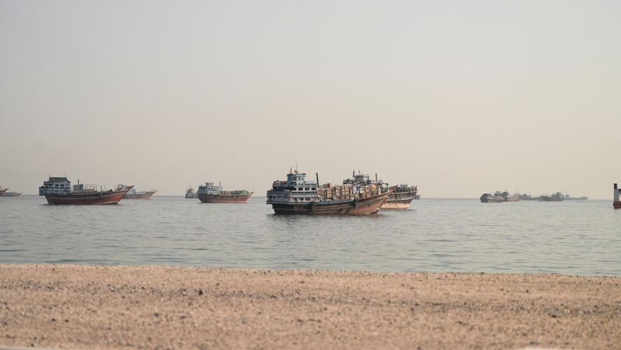 Vessels are anchored in the Strait of Hormuz as seen from Musandam
