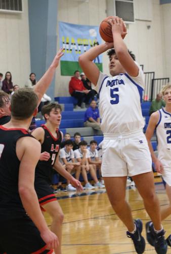 Overton boys hold on to defeat Coyotes