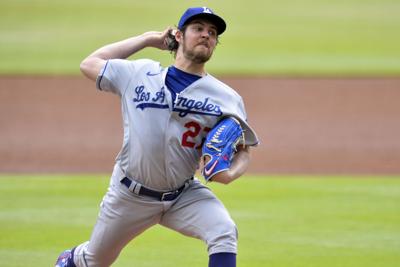 Trevor Bauer of the Los Angeles Dodgers pitches against the Atlanta Braves in the first inning at Truist Park on June 6, 2021 in Atlanta.