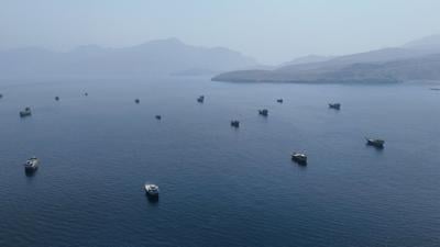 FILE PHOTO: A drone view shows vessels near the Strait of Hormuz, as seen from Musandam