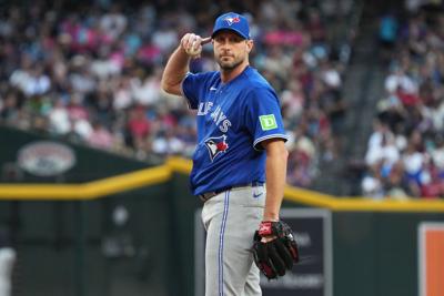 Toronto Blue Jays pitcher Max Scherzer reacts against the Arizona Diamondbacks at Chase Field.