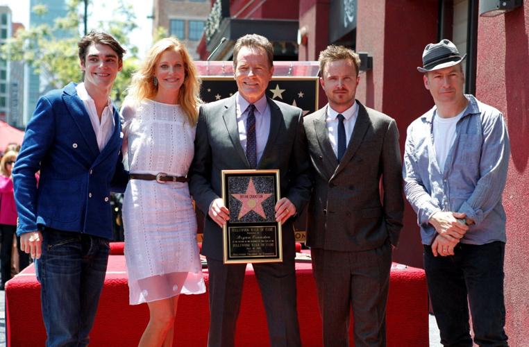 FILE PHOTO: Bryan Cranston and co-stars of "Breaking Bad" pose during ceremonies to unveil Cranston's star on the Hollywood Walk of Fame
