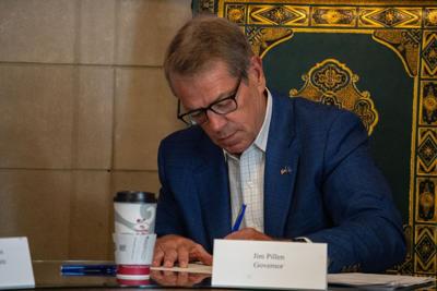 Jim Pillen signs (single-use photo)