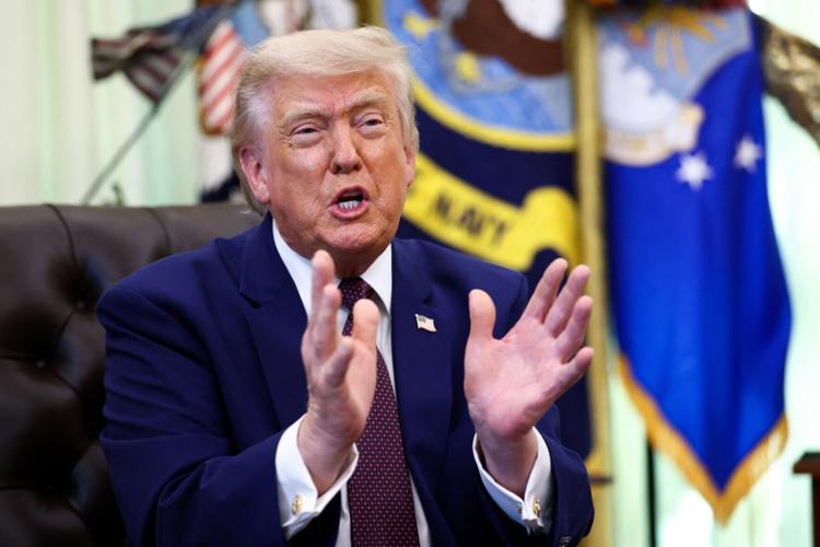 U.S. President Trump speaks after signing an executive order at the Oval Office of the White House, in Washington