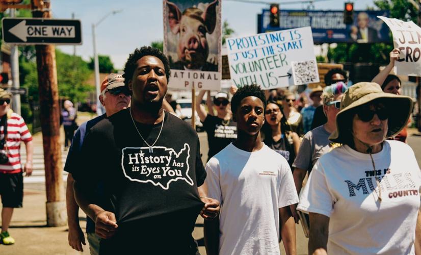 Demonstrators march during the “Memphis Won’t Be Silenced” march and rally from I AM A MAN Plaza to the National Civil Rights