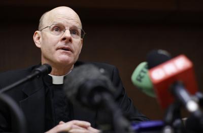 U.S. priest and psychologist Rossetti talks during a news conference in downtown Rome