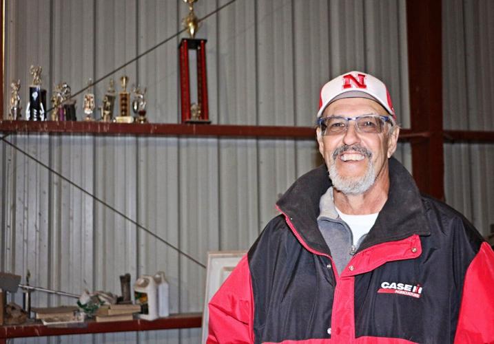 Gering farmer passing on his irrigation boots