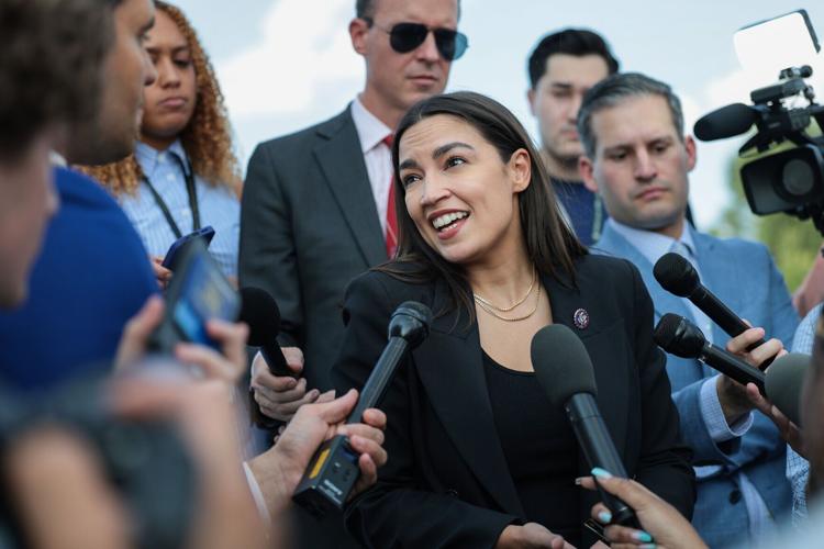 Alexandria Ocasio-Cortez speaks to reporters near the House steps after a series of votes at the U.S. Capitol on July 22, 2026, in Washington, D.C..