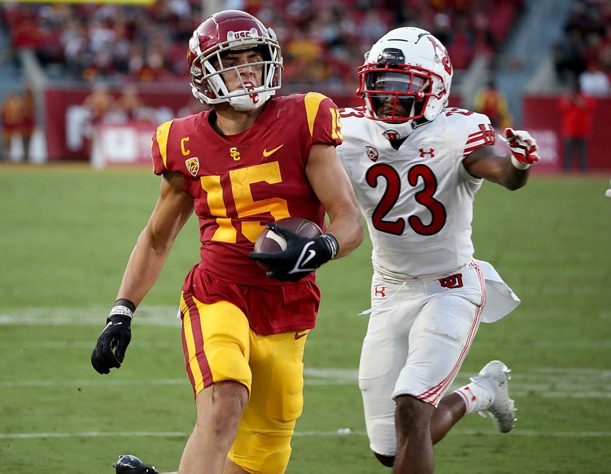 USC receiver Drake London heads into the end zone with a 20- yard touchdown catch against Utah in the first half at the Los Angeles Memorial Coliseum on Saturday, Oct. 9, 2021.
