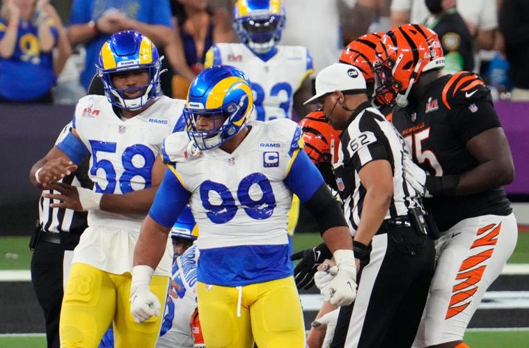 Feb 13, 2022; Inglewood, CA, USA; Los Angeles Rams defensive end Aaron Donald (99) reacts after a sack against the Cincinnati Bengals in the third quarter of Super Bowl LVI at SoFi Stadium. Mandatory Credit: Robert Hanashiro-USA TODAY Sports