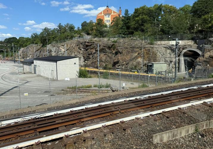 A white-coloured railway track, as seen from a metro window, in Stockholm