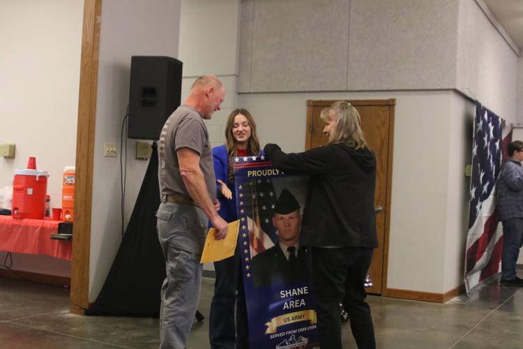 Overton Veterans Banner Reveal program