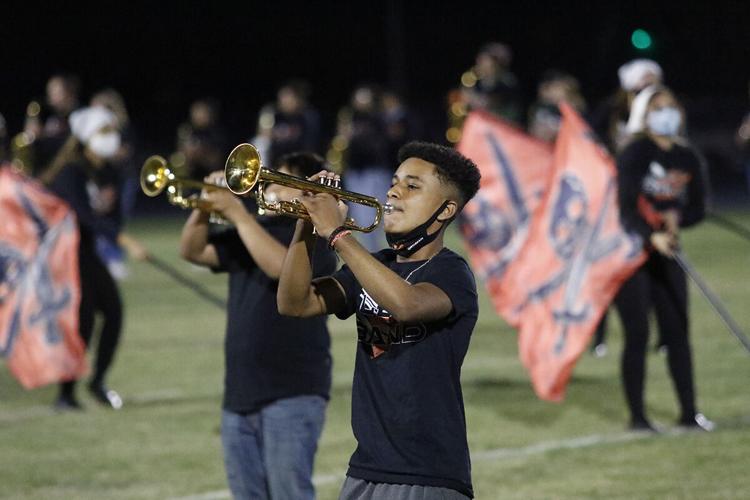 With no competitions to attend, Pride of the Minuteman Marching Band performs for the Lexington community