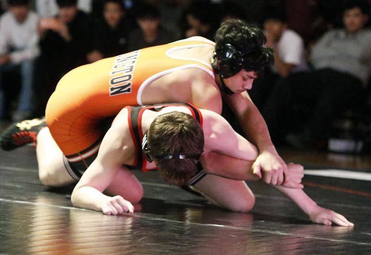 Lexington boys win dual over Cozad