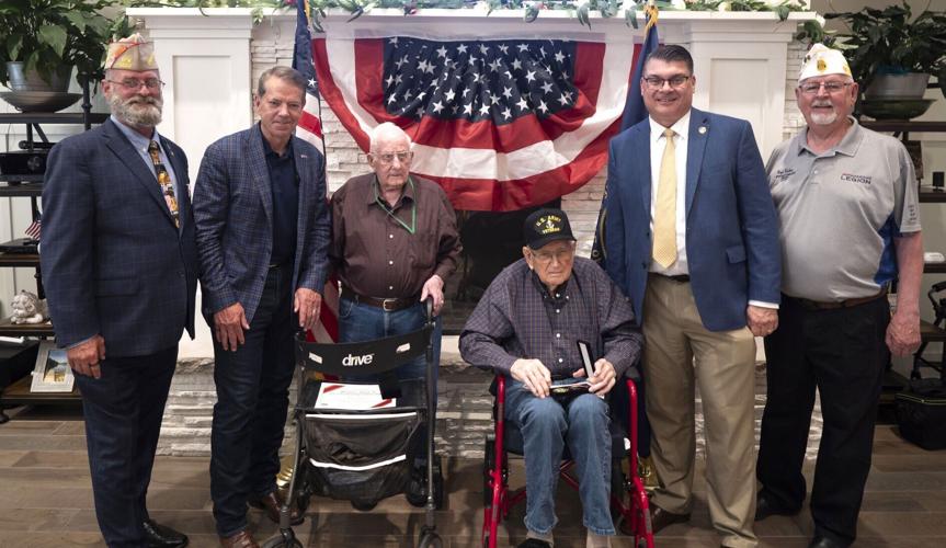 World War II veterans honored by governor at Lincoln assisted living center
