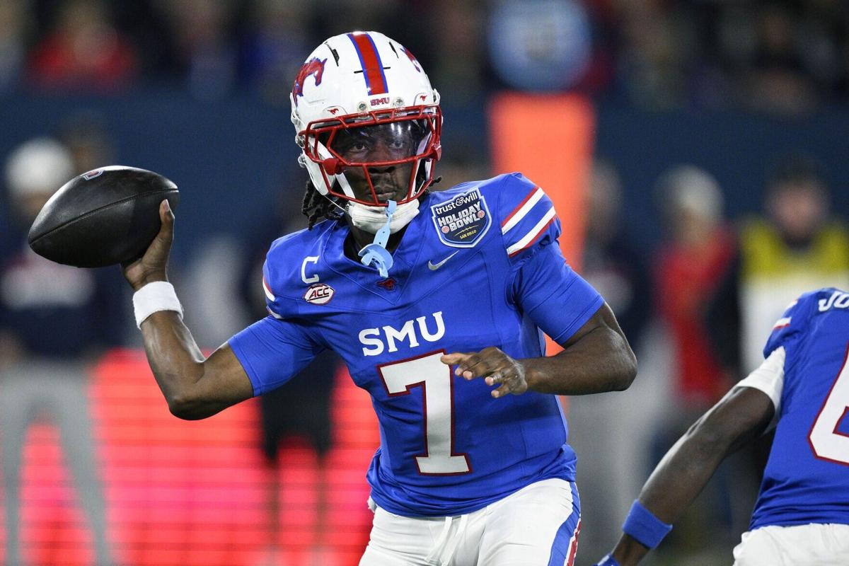 Southern Methodist quarterback Kevin Jennings throws a pass against Arizona during the first half of the Trust& Will Holiday Bowl at Snapdragon Stadium on Friday, Jan. 2, 2026, in San Diego.