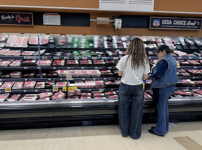 Customers shop for beef at a grocery store on April 06, 2026 in Los Angeles, California.