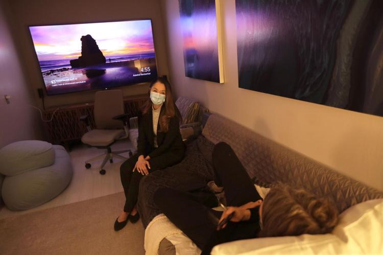 Psychotherapist Karina Sergi, left, talks with Melanie Senn, who prepares for a psilocybin session on Feb. 24 at the Pacific Neuroscience Institute in Santa Monica.