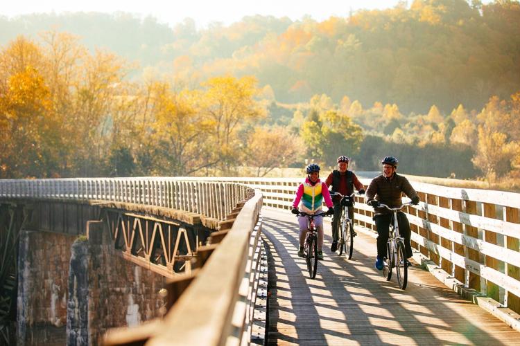 Visitors enjoy a ride on the Virginia Creeper Trail.