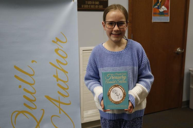 Lucy Martin shows off her new book