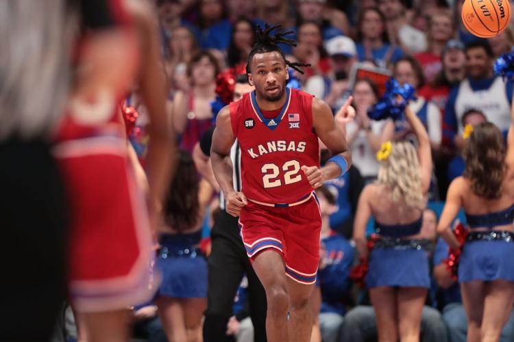 Kansas Jayhawks guard Darryn Peterson (22) looks back after scoring against Kansas State Wildcats during the Sunflower Showdown game inside Allen Fieldhouse in Lawrence, Kansas, on Saturday, March 7, 2026.