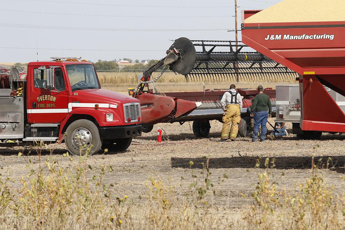 Fire in a combine draper head summons Overton firefighters on Friday
